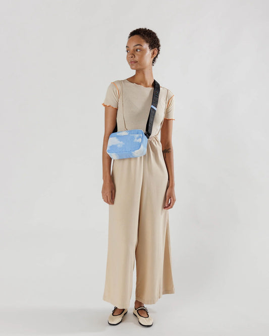 Camera Cross Body Bag with Cloud Pattern Main and Black Strap with Black De-bossed "BAGGU" Text 
