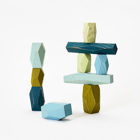 Colourful wooden blocks in various shapes and to stack balance and play with